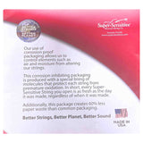 The image shows packaging from Super-Sensitive Musical String Co., Sarasota, Florida, highlighting their corrosion-proof, molecular-lined technology that prevents oxidation and preserves string freshness. It features eco-friendly claims of 60% less paper waste, quality seals including "Sealed Packaging," "Better Strings Better Planet," and a "Made in USA" badge, emphasizing premium, sustainable musical instrument strings.