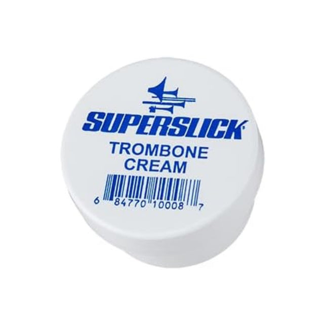 The image shows a container of Superslick Trombone Cream, a specialized lubricant for trombone slides. Housed in a white, round container with blue text and the Superslick logo, this product ensures smooth slide movement for accurate pitch control. Essential for trombone players, it helps maintain the instrument’s performance and prolongs its lifespan.
