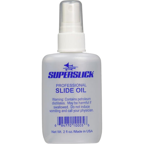 The image shows a 2 fl oz clear plastic spray bottle of Superslick Professional Slide Oil for brass instruments. The label features a blue Superslick logo and a safety warning about petroleum distillates. This lubricating oil helps trombone and trumpet slides move smoothly, preventing sticking and ensuring optimal performance and longevity of brass instruments.