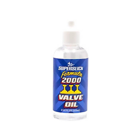 The image shows a 2 fl. oz. (60ml) bottle of Superslick Formula 2000 Valve Oil, a specialized lubricant for brass instrument valves like trumpets, cornets, and flugelhorns. The bottle has a blue label with clear branding. Valve oil is essential for maintaining smooth valve movement and preventing sticking, ensuring optimal performance for valved brass instruments.