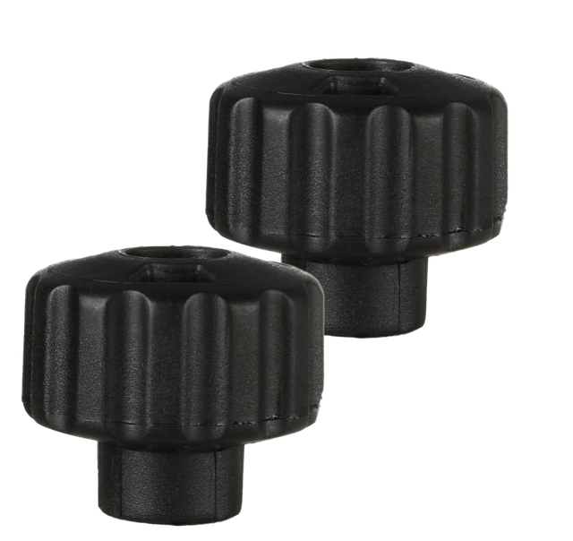 The image shows two black plastic control knobs with ribbed edges, designed for better grip. They have hollow centers for mounting on potentiometers and are likely used as replacement or aftermarket knobs on musical audio equipment such as guitar amps, mixers, effects pedals, synthesizers, or studio gear, allowing adjustment of volume, tone, gain, or effects settings.