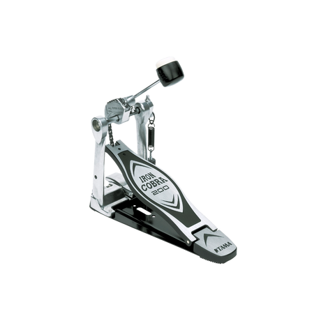 The image shows a Tama Iron Cobra 200 series bass drum pedal, featuring the distinctive branding on the footplate and Tama logo. It has a chain-drive mechanism, adjustable beater with a black rubber/felt head, and a spring return. The pedal is made of sturdy metal with a silver, chrome, and black finish. Known for reliability and smooth operation, it’s an intermediate-level pedal suitable for practice and performance.