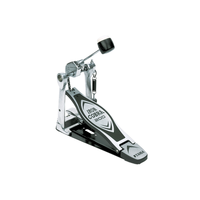 The image shows a Tama Iron Cobra 200 series bass drum pedal, featuring the distinctive branding on the footplate and Tama logo. It has a chain-drive mechanism, adjustable beater with a black rubber/felt head, and a spring return. The pedal is made of sturdy metal with a silver, chrome, and black finish. Known for reliability and smooth operation, it’s an intermediate-level pedal suitable for practice and performance.