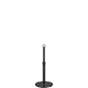The image shows a black microphone stand with a round, weighted base and an adjustable telescoping pole. It features a microphone clip at the top for holding a microphone. Commonly used in live performances, studios, and broadcasting, the stand’s height adjustment and sturdy base ensure stability and optimal microphone placement for vocals and instruments.