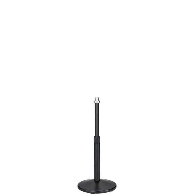 The image shows a black microphone stand with a round, weighted base and an adjustable telescoping pole. It features a microphone clip at the top for holding a microphone. Commonly used in live performances, studios, and broadcasting, the stand’s height adjustment and sturdy base ensure stability and optimal microphone placement for vocals and instruments.