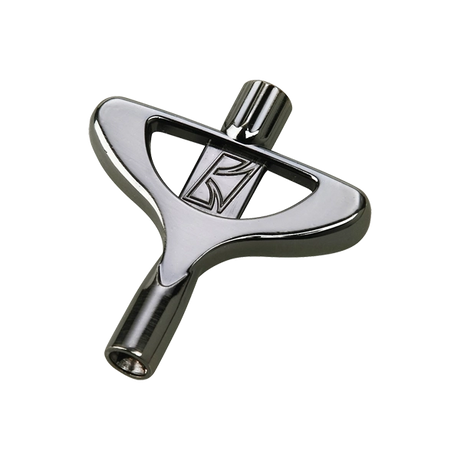 The image shows a T-shaped drum tuning key with a polished metal finish. It has a square socket in the center to fit drum tension rods and ergonomic curved handles for comfortable grip and leverage. A logo, possibly "KR," is visible in the middle. This essential tool helps drummers adjust drumhead tension for tuning, combining durability and comfort in a high-quality design.