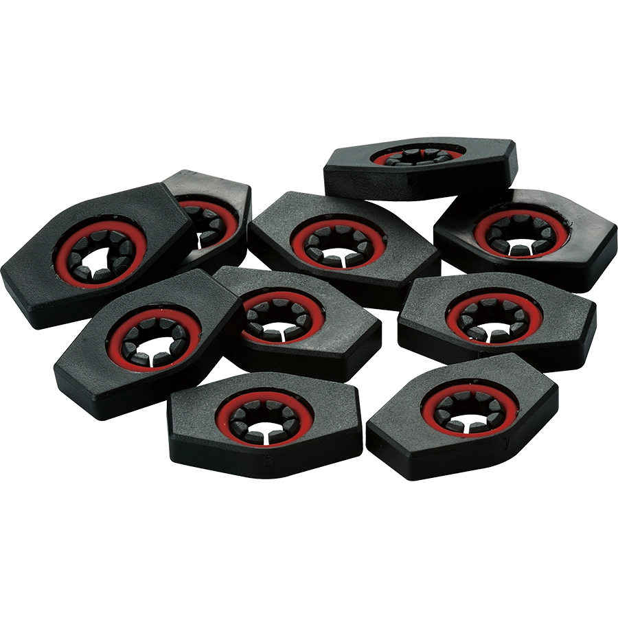 The image shows black hexagonal tuning machine bushings with red rubber gaskets around central holes. These guitar hardware pieces fit around tuning post shafts, securing tuning machines to the headstock. The hex shape allows wrench installation, while the red gaskets provide a tight seal and reduce vibration. Made of metal with a black finish, they are essential for guitar assembly, repair, or upgrades.