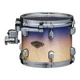 The image shows a mounted tom-tom drum with a gradient finish fading from deep blue to cream. It has chrome hardware, including tension rods, lugs, and a mounting bracket. A "Starclassic" badge on the shell indicates it’s a Tama drum from their Starclassic series. This drum is part of a larger kit, mounted on a stand or rack, with a professional look suitable for stage or studio use.