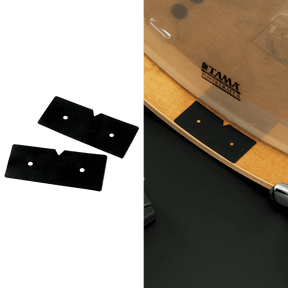 The image shows drum dampening pads: two black rectangular pads with small holes on a white background, and the same pads placed on a TAMA drum kit’s drum head (likely a tom or snare). These foam or rubber-like pads are used to reduce overtones, control sustain, and create a focused, dampened sound by temporarily muffling the drums during play or recording.