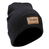 Black beanie with a brown leather patch featuring 'Taylor' branding on a white background.