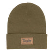 Green beanie with a Taylor logo patch on a white background