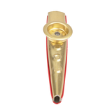 Gold metal kazoo with a red bottom on a white background