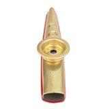 Gold metal kazoo with a red bottom