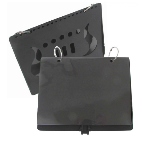 The image shows a black folding music stand with a matte metal finish. It features an adjustable flat music sheet holder with perforated and decorative flame-like cutouts, metal rings to secure sheets, and foldable legs for height adjustment and easy transport. This portable stand suits various musicians for practice or performance, combining functionality with a sleek, versatile design.