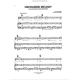 The image shows a page of sheet music for "Unchained Melody" from the film "Unchained," with lyrics by Hy Zaret and music by Alex North. It features a moderately slow 4/4 tempo in C major, written for voice and piano with chord symbols (C, Am, F, G). The sheet includes treble and bass clefs, vocal lyrics beneath the melody, and piano accompaniment parts. Visible lyric fragments include words like "When," "love," and "darlin'."