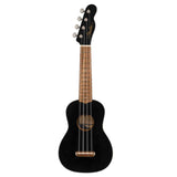 The image shows a black ukulele with a classic small body, natural wood neck and fretboard with markers, four strings, and four tuning pegs on a black headstock featuring "Fender" branding. It has a central sound hole and a bridge at the bottom. The ukulele is likely soprano or concert size, combining a sleek black finish with traditional design.