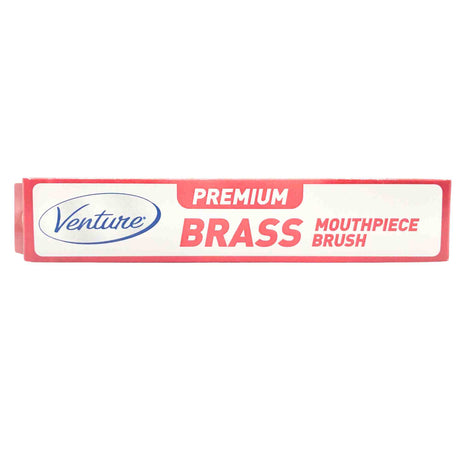 The image shows a Venture Premium Brass Mouthpiece Brush in red and white packaging. This specialized cleaning tool is designed for brass instruments like trumpets, trombones, French horns, and tubas. It features bristles shaped to clean inside mouthpieces, removing buildup to maintain hygiene and ensure optimal sound quality without damaging the metal surface.