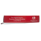 The image shows a red McMillan Music packaging box for precision musical instrument cleaning brushes. It features the text "The Highest Quality, Precision Musical Brushes in the World" and the McMillan Music logo with a saxophone. The box indicates the product is made in the USA by McMillan Music Co. LLC in New Britain, PA. These brushes are designed for cleaning brass and woodwind instruments like saxophones, trumpets, clarinets, and flutes.