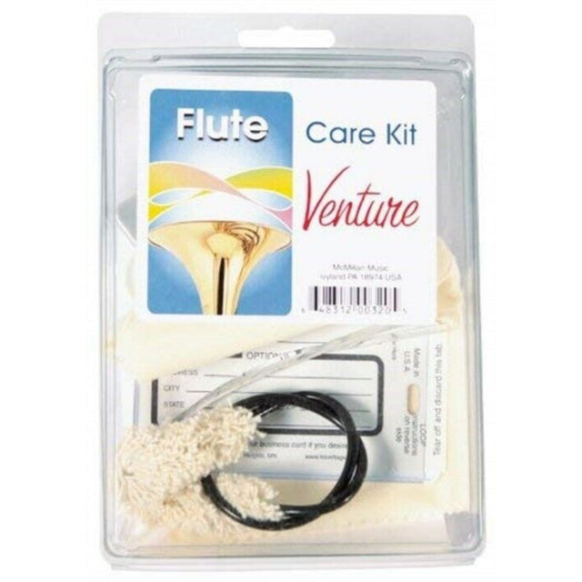 The image shows a Venture Flute Care Kit in clear blister packaging, containing essential cleaning tools for flute maintenance. Inside are a cleaning rod, a white pull-through swab with a weighted cord, and a cloth for removing moisture and debris from the flute. The label features the Venture brand and a flute illustration. This kit helps flute players keep their instrument clean and in good condition.