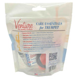 The image shows a Venture Pro-Quality Products trumpet care kit in a clear pouch labeled "Care Essentials for Trumpet." It includes valve oil, slide grease, mouthpiece and valve casing brushes, a flexible bore brush, polishing cloth, and a case ID tag. The kit comes with instructions and provides essential tools for cleaning, lubricating, and maintaining trumpet performance and longevity. Made in the USA.