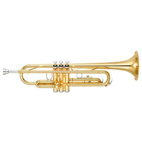 The image shows a polished golden brass trumpet with three piston valves featuring white caps, curved tubing, a flared bell, and a silver mouthpiece. It appears to be a standard B♭ trumpet with visible tuning slides and valve casings typical of professional or intermediate quality. This brass wind instrument is widely used in classical, jazz, marching bands, and popular music.